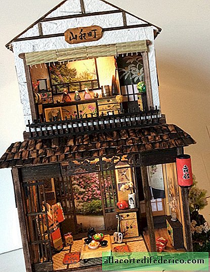 Der Künstler schafft Miniaturen japanischer Häuser, die mit traditionellen Details gefüllt sind.