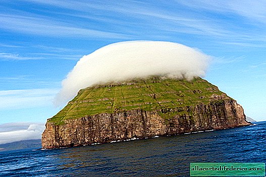 جزيرة مع تاج الغيوم. واحدة من أكثر الأماكن مذهلة على كوكبنا!