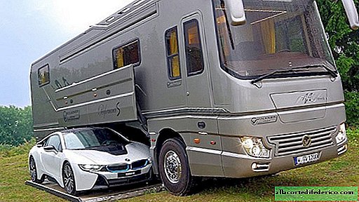 The most fantastic mobile home with its own garage and car inside